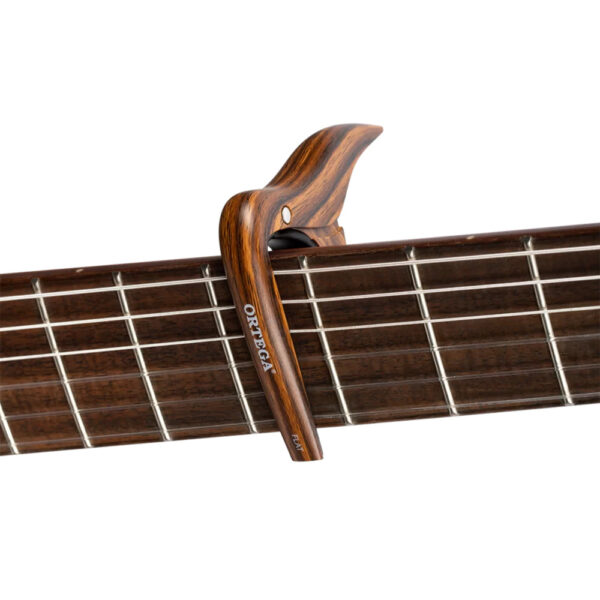 Ortega Flat Classical Guitar Capo - Walnut - On Guitar