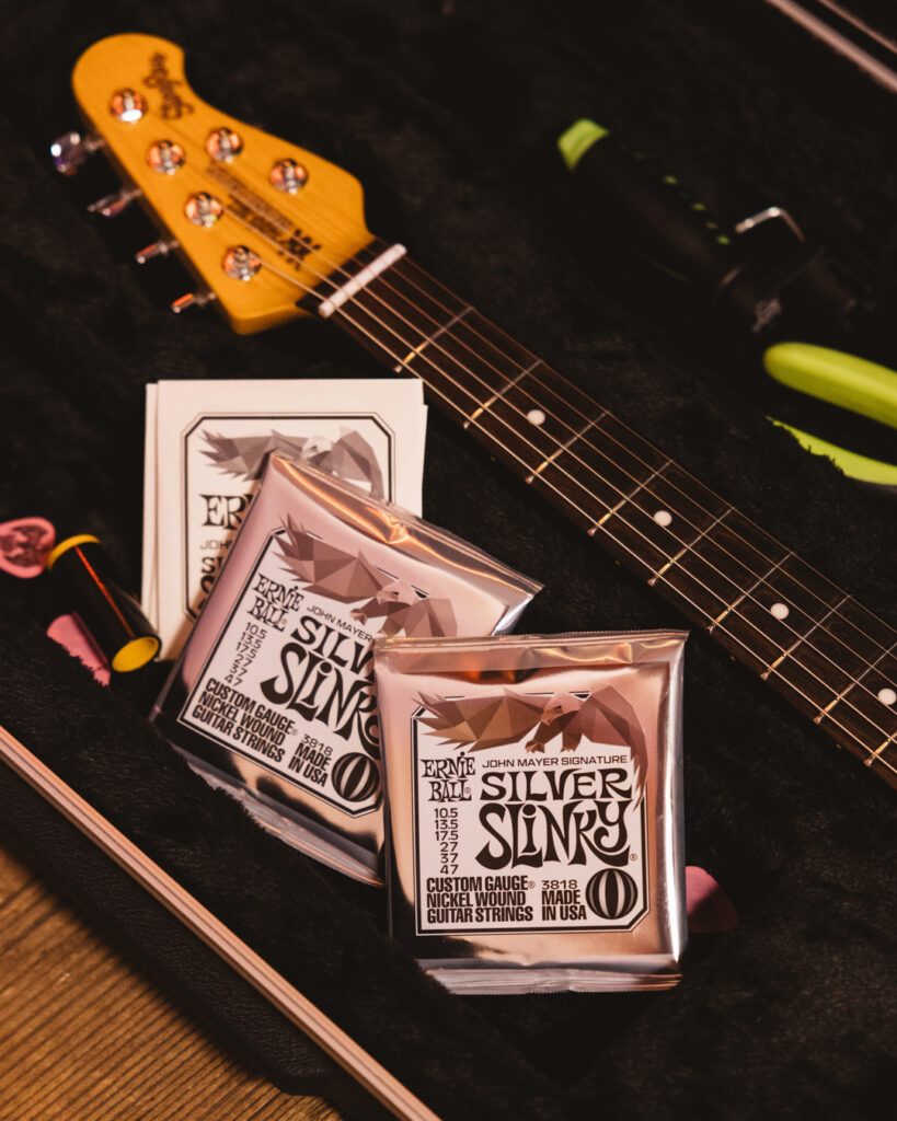 Ernie Ball Silver Slinky John Mayer Signature Electric Guitar Strings - 10.5-47 - Promo 1